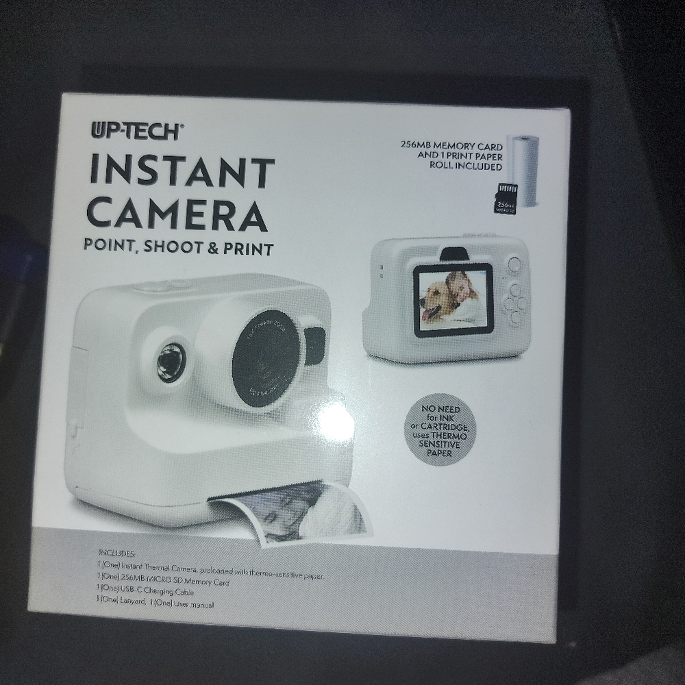 Up tech instant camera